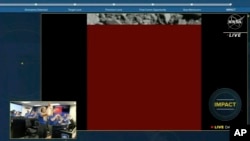 In this image made from a NASA livestream, the Double Asteroid Redirection Test spacecraft crashes into an asteroid as the spacecraft's feed cuts out from impact on Sept. 26, 2022.