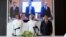 QatarEnergy CEO and Qatar's Minister of Energy Saad al-Kaabi, bottom row center, stands at a signing ceremony with Sinopec, in Doha, Qatar, Nov. 21, 2022.