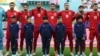 Iranski fudbaleri slušaju himnu uoči meča sa Engleskom, na Svjetskom prvenstvu u Kataru (Foto: AFP/Fadel Senna)