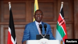 FILE - Kenya's President William Ruto addresses the nation to announce new Cabinet Secretaries in his government, in the wake of nationwide protests over new taxes, at State House in Nairobi, July 19, 2024.