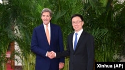中國國家副主席韓正在北京會晤到訪的美國氣候特使克里。（2023年7月19日）