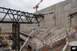 FILE - The Paris2024 Olympics Porte de la Chapelle Arena building site is pictured Monday, Jan. 23, 2023 in Paris.