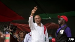 O líder do partido da oposição angolana, UNITA, Adalberto Costa Júnior, durante o último comício da campanha da UNITA antes das eleições gerais, em Luanda, a 22 de agosto de 2022.