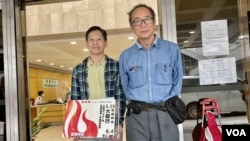 前支聯會常委鄧岳君（左）及徐漢光就拒絕向國安警提交資料案，被定罪及判處入獄4個半月，向高等法院提出上訴。(美國之音湯惠芸)