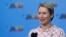 FILE - Estonia's Prime Minister Kaja Kallas speaks with the media as she arrives for a NATO summit in Vilnius, Lithuania, July 12, 2023.