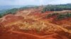Lokasi penambangan nikel yang dioperasikan oleh Gema Kreasi Perdana (GKP) terletak di samping perkebunan milik warga desa di Wawonii, Sulawesi Tenggara, sebagai ilustrasi. Produsen nikel utama China, Tsingshan Group, memulai produksi pemurnian nikel di Indonesia. (Foto: AFP)