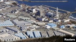 资料照：鸟瞰福岛核电站的废水储存罐。（2021年2月13日）