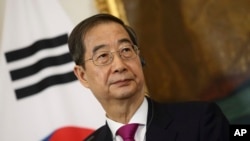 ལྷོ་ཀོ་རི་ཡའི་སྲིད་བློན་ཧན་ཏུག་སུ།