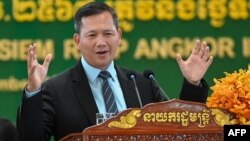 រូបឯកសារ៖ នាយករដ្ឋមន្ត្រីកម្ពុជាលោក ហ៊ុន ម៉ាណែត ថ្លែងនៅក្នុងពិធីសម្ពោធអាកាសយានដ្ឋានអន្តរជាតិសៀមរាបអង្គរ ក្នុងខេត្តសៀមរាប កាលពីថ្ងៃទី១៦ ខែវិច្ឆិកា ឆ្នាំ២០២៣។