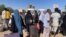 People gather at the station to flee from Khartoum during clashes between the paramilitary Rapid Support Forces and the army in Khartoum, Sudan, April 19, 2023. 