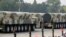 ARCHIVO - Vehículos militares que transportan misiles balísticos intercontinentales pasan por la Plaza de Tiananmen durante el desfile militar que marca el 70 aniversario de la fundación de la República Popular China, en Beijing, el 1 de octubre de 2019.