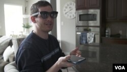 Josh Kingsley using XRAI Glass's AR glasses