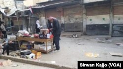 Dîmeneke dikanên Kolana Filîstinê li alîyê hikûmeta Sûrî.