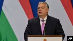 FILE - Hungarian Prime Minister Viktor Orban speaks during a press conference at the Carmelite Monastery in Budapest, Hungary, on Feb. 23, 2024.