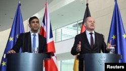 “Ми [з Німеччиною] єдині в тому, що хочемо підтримувати Україну стільки, скільки буде потрібно”, — заявив прем'єр Британії Ріші Сунак під час пресконференції із канцлером Німеччини Олафом Шольцом. Фото: Reuters/Annegret Hilse