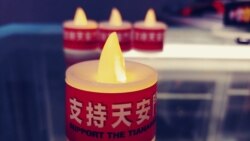 政治紅線下尋找悼念空間 香港前區議員派發蠟燭喚起港人六四回憶