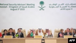 A handout picture provided by the Saudi Press Agency (SPA) on Aug. 6, 2023 shows Saudi Arabia's National Security advisor and Minister of State Musaad bin Mohammed al-Aiban (C) speaking during a National Security advisors' meeting in Jeddah. 