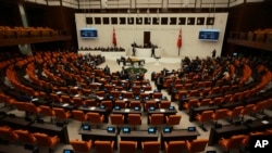 FILE - Turkey's parliament chamber is seen after lawmakers voted in favor of Finland's bid to join NATO, in Ankara, March 30, 2023. The body's foreign affairs committee on Dec. 26, 2023, resumed deliberations on Sweden's bid to join NATO.