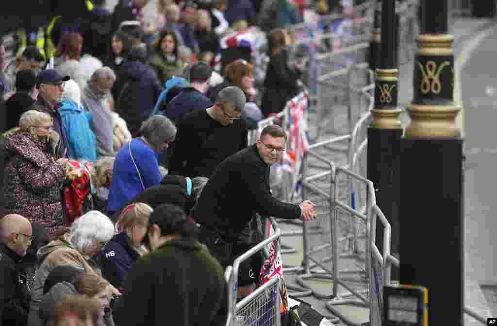 A crowd gathers at Whitehall ahead of the coronation ceremony for Britain's King Charles III in London, May 6, 2023.