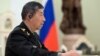 FILE - Chinese Defense Minister Li Shangfu attends a meeting with Russian President Vladimir Putin and Defense Minister Sergei Shoigu in Moscow, April 16, 2023. (Sputnik/Pavel Bednyakov/Pool via Reuters.)