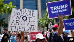 Donald Tramp tarafdorlari va unga qarshilar Mayamida federal sud oldida namoyishda, 13-iyun, 2023 