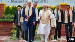 Waziri Mkuu wa India Narendra Modi (katikati), Rais wa Marekani Joe Biden (kushoto) na viongozi wengine wakati wa mkutano wa G20 huko New Delhi, Septemba 10, 2023. Picha na PIB / AFP. 