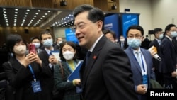 Chinese Foreign Minister Qin Gang walks after delivering a keynote speech during the "Lanting Forum" in Beijing, Feb. 21, 2023.