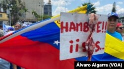 Trabajadores venezolanos exigen salarios digno durante una movilización por el Día Internacional del Trabajador. 