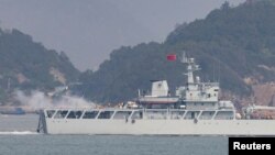 เรือรบจีนเข้าร่วมการซ้อมรบใกล้เมืองฝูโจว ไม่ไกลจากน่านน้ำของไต้หวัน เมื่อวันที่ 8 เมษายน 2023 (แฟ้มภาพรอยเตอร์) 