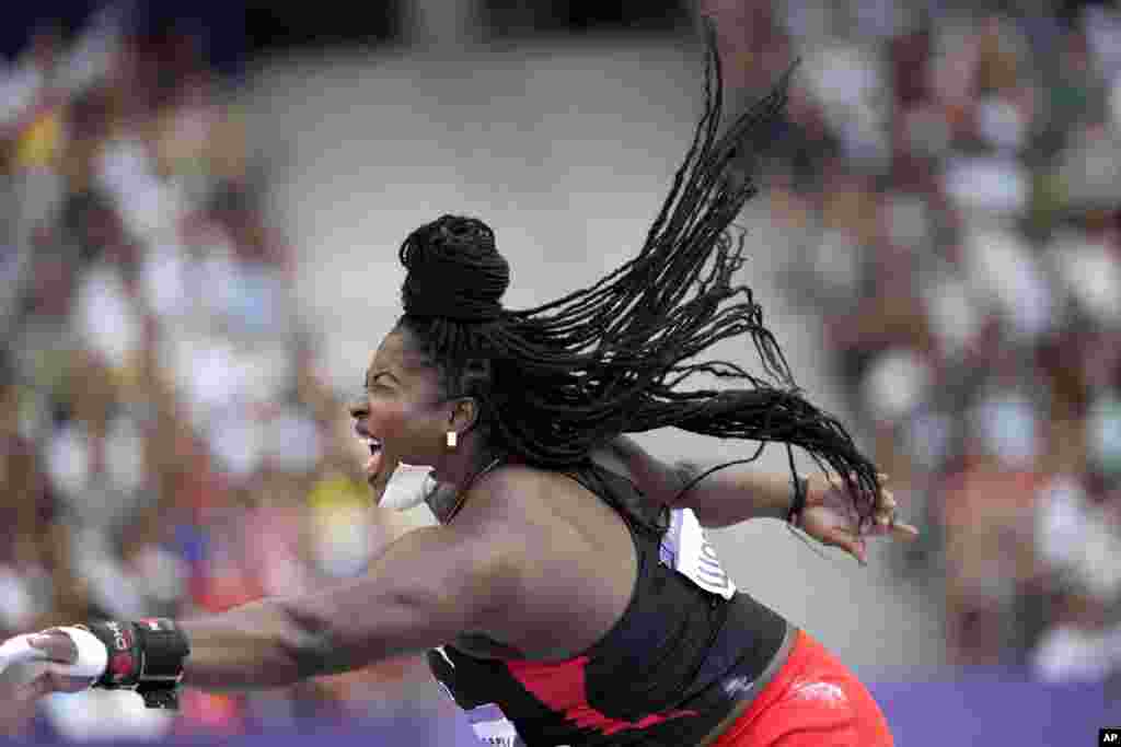 Portious Warren of Trinidad and Tobago competes during the women's shot put qualification at the 2024 Summer Olympics in Saint-Denis, France.