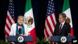 FILE — Mexico's Foreign Minister Alicia Barcena, left, speaks as U.S. Secretary of State Antony Blinken listens at the U.S. State Department in Washington, Sept. 29, 2023. Blinken was in Mexico on Wednesday to discuss the drug trade and the humanitarian crisis at the border.