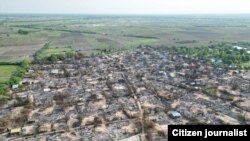 စစ်ကောင်စီနယ်မြေရှင်းလင်းရေးအတွင်း စစ်ကိုင်းတိုင်း စစ်ကိုင်းမြို့နယ်ထဲက မီးဘေးသင့်ကျေးရွာတရွာကိုတွေ့ရစဉ် (မေ၊ ၂၀၂၃)