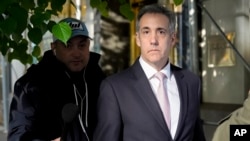 Michael Cohen, mantan pengacara dan perantara politik Donald Trump, dalam perjalanan untuk memberi kesaksian di pengadilan Manhattan, New York, Senin 13 Mei 2024.