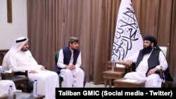 مولوی عبدالکبیر، معاون سیاسی ریاست‌الوزرای حکومت طالبان و شیخ محمد بن عبدالعزیز آلخلیفی، وزیر دولت در امور خارجه قطر