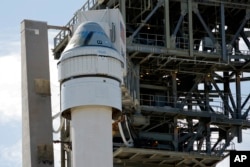 Boeing's Starliner capsule atop an Atlas V rocket stands ready for its upcoming mission at the Cape Canaveral Space Force Station, Sunday, May 5, 2024, in Cape Canaveral, Fla. Launch is scheduled for Monday evening. (AP Photo/Terry Renna)