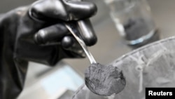 FILE - Graphite is pictured in Salzgitter, Germany, May 18, 2022. China, the world’s preeminent graphite supplier, said Oct. 20, 2023, that it would tighten export controls on the substance, which is key to construction of batteries used in electric cars.