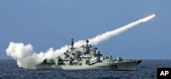 资料照 - 解放军海军南海舰队在一次实弹演习中发射导弹。