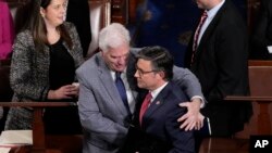 U.S. Rep. Mike Johnson, R-Louisina, is congratulated by Rep. Tom Emmer, R-Minnesota, after Johnson's election as speaker, at the Capitol in Washington, Oct. 25, 2023.