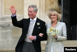 FILE - Britain's Prince Charles and The Duchess of Cornwall leave St. George's Chapel in Windsor Castle, southern England, following the Service of Prayer and Dedication following their marriage, Apr. 9, 2005.