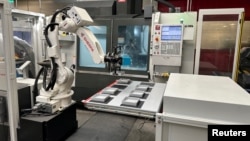 A robot machine is seen at ROLEC Gehause-Systeme in Rinteln, Germany on October 6, 2023. (Courtesy of Matthias Rose/Handout via REUTERS)