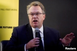 FILE - New York Federal Reserve President John Williams speaks at an event in New York, Nov. 6, 2019.