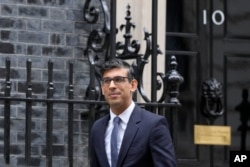 英國首相辛偉誠。