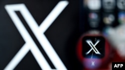 Logo dari media sosial X dalam foto ilustrasi yang diambil pada 11 Maret 2024. (Foto: AFP/Kirill Kudryavtsev)