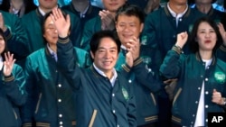 FILE - The ruling Democratic Progressive Party presidential candidate William Lai waves during the party congress of the ruling Democratic Progressive Party in Taipei, July 16, 2023.