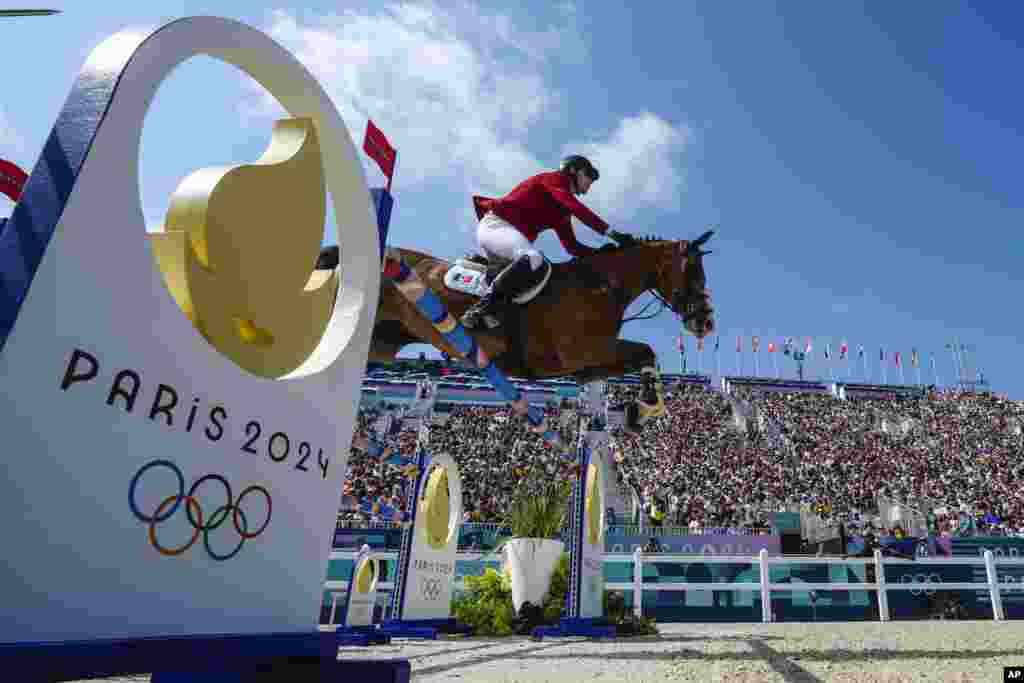 Mexico's Carlos Hank Guerreiro, riding H5 Porthos Maestro Wh Z, competes in the equestrian team jumping qualifier at the 2024 Summer Olympics in Versailles, France.