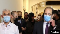 巴勒斯坦哈馬斯加沙領導人葉海亞·辛瓦爾和埃及情報總局局長阿巴斯·卡邁勒2021年5月31日在加薩會面。