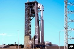 Boeing's Starliner capsule atop an Atlas V rocket stands ready for its upcoming mission at the Cape Canaveral Space Force Station, Sunday, May 5, 2024, in Cape Canaveral, Fla. Launch is scheduled for Monday evening. (AP Photo/John Raoux)