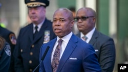 FILE - New York City Mayor Eric Adams speaks in New York's Times Square during a news conference, Dec. 30, 2022. (AP Photo/Ted Shaffrey, File)