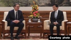 2023年10月17日塞爾維亞共和國總統武契奇在北京會見王滬寧。