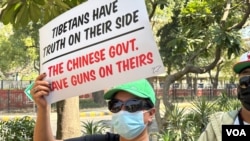 流亡藏人参加纪念西藏起义纪念日65周年的抗议游行